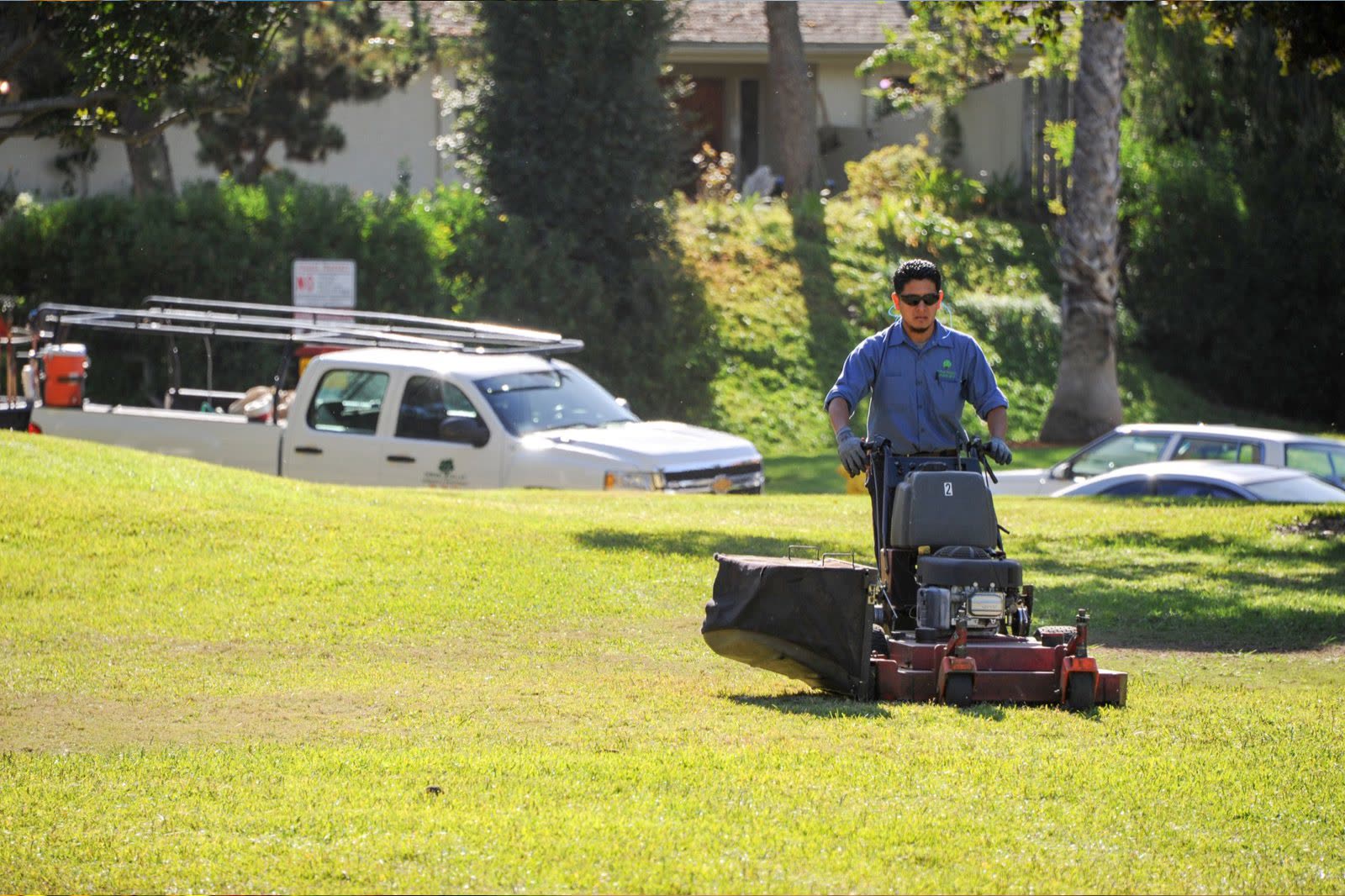Green Valley Landscape crew mowing a community lawn